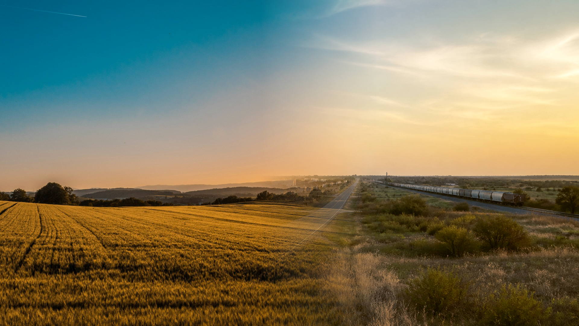 Golden-hour North Texas landscape showing open farmland transitioning toward new rooftops and a distant highway corridor in Grayson County