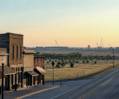 Scenic North Texas small-town lakeside corridor near Lake Texoma at soft morning light, rolling shoreline and open sky—no people, no seals, no text