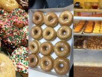 Sprinkle Donut Gunter — fresh glazed, chocolate, and sprinkle donuts plus the bakery display case